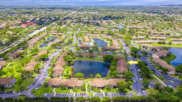 birds eye view of property featuring a water view