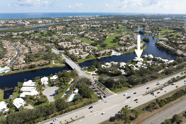 bird's eye view with a water view