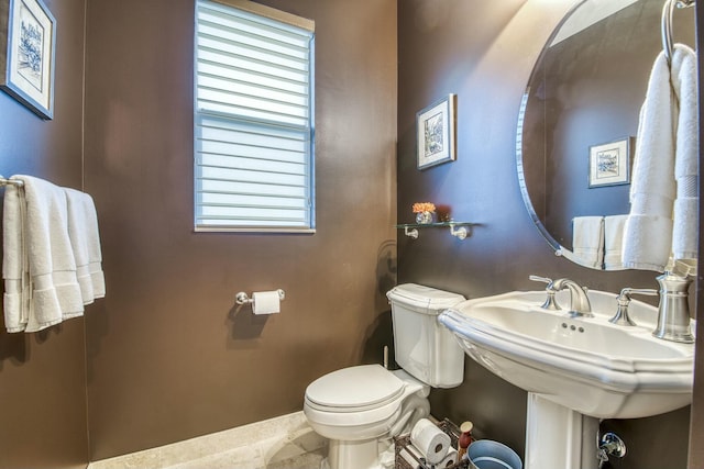 bathroom with toilet and sink