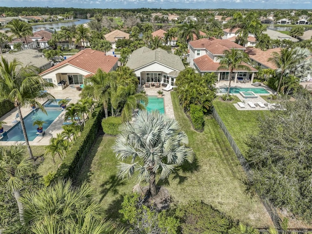 bird's eye view with a water view