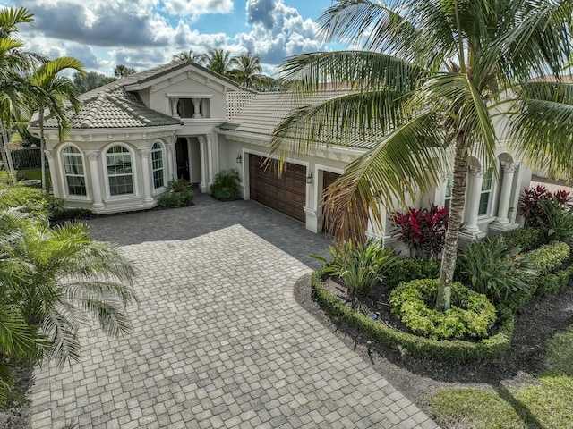 view of front of property with a garage