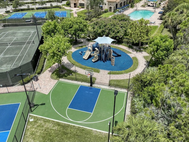 view of sport court with a playground and tennis court