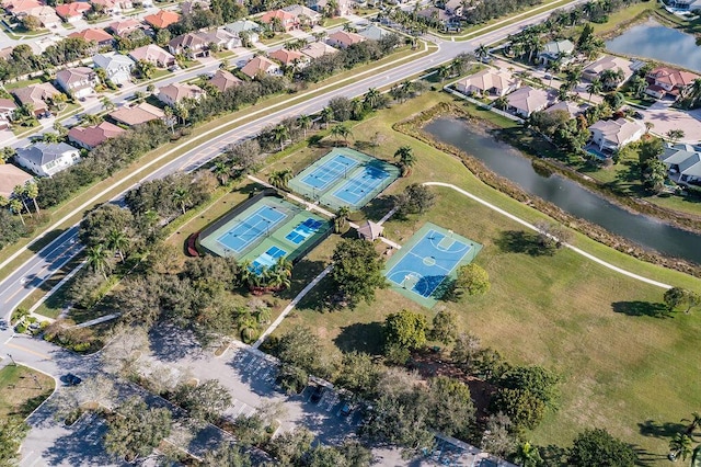 aerial view featuring a residential view and a water view