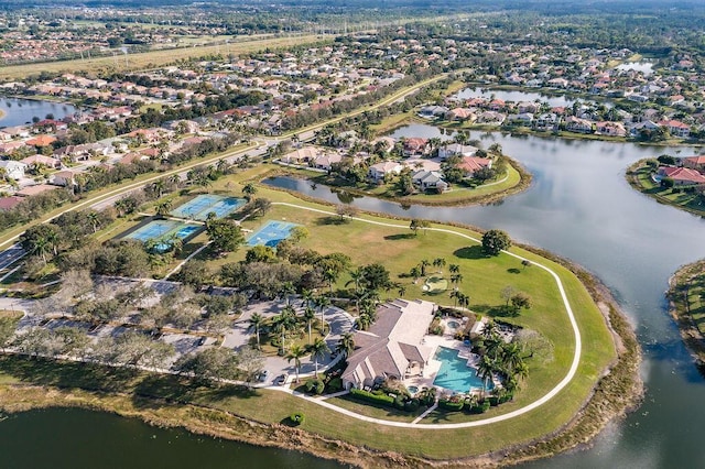 drone / aerial view with a water view