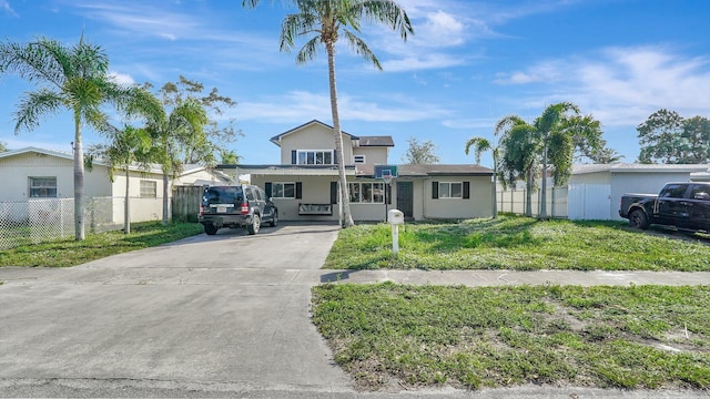 view of front facade with a front yard