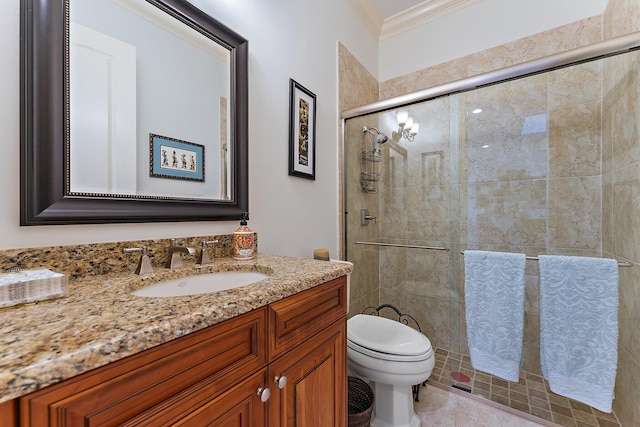 bathroom with crown molding, toilet, vanity, and walk in shower