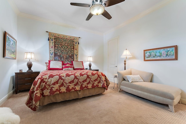 carpeted bedroom featuring crown molding and ceiling fan