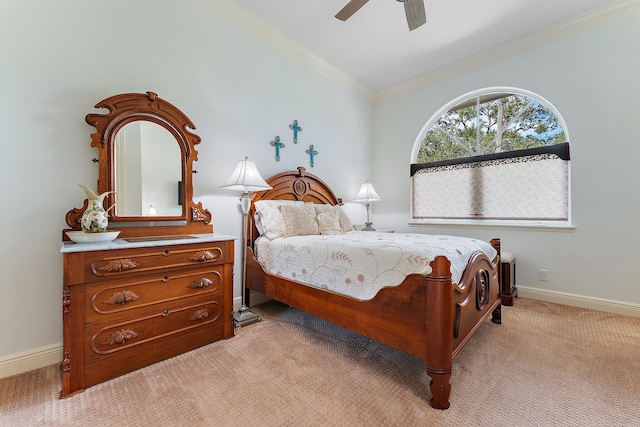 bedroom featuring crown molding, light carpet, and ceiling fan