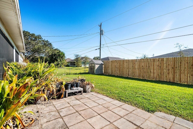 view of patio with an outdoor structure, a storage shed, and fence