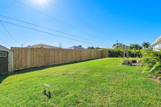 view of yard with fence