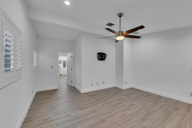 spare room with ceiling fan and light hardwood / wood-style floors