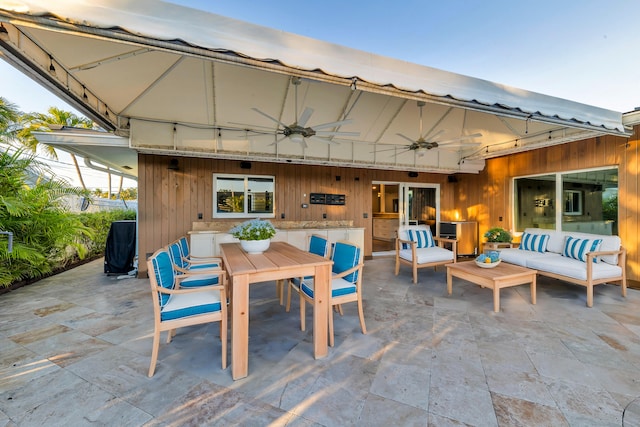 view of patio / terrace with outdoor lounge area and ceiling fan