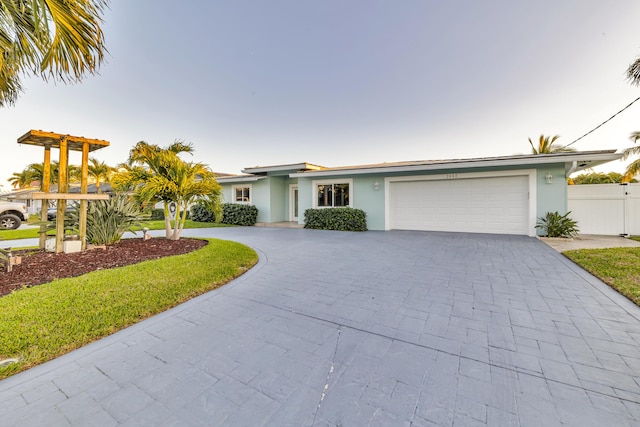 view of front of home featuring a garage