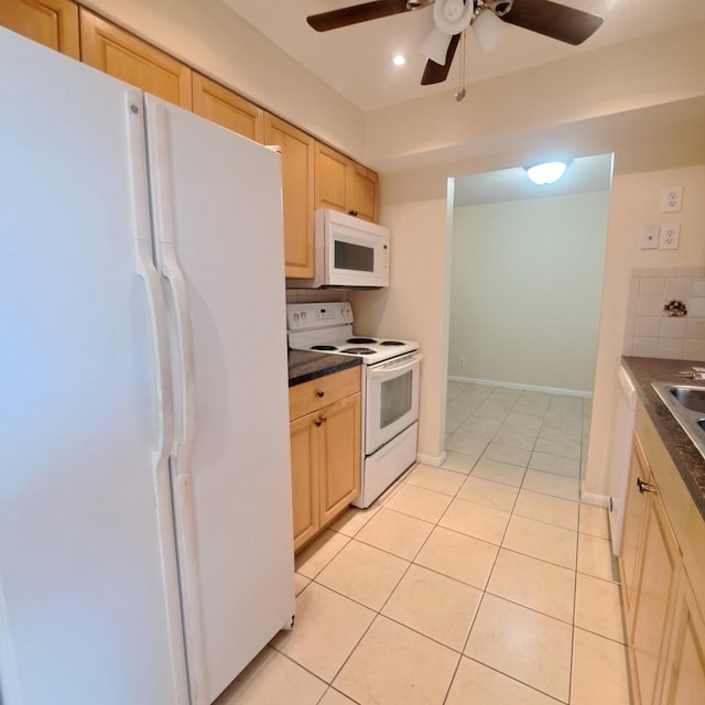 kitchen with light brown cabinetry, white appliances, light tile patterned floors, ceiling fan, and decorative backsplash