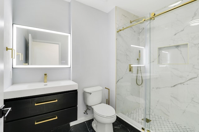 bathroom featuring a shower with door, vanity, and toilet