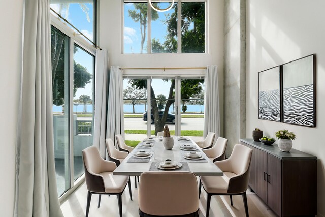 empty room featuring hardwood / wood-style floors and a water view