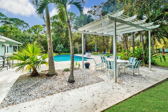 exterior space with an outdoor pool and a pergola