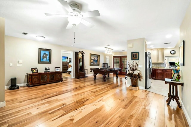 interior space with billiards, light wood-style flooring, baseboards, and ceiling fan