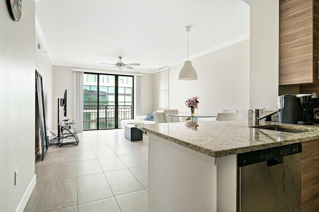 kitchen featuring sink, crown molding, decorative light fixtures, stainless steel dishwasher, and light stone countertops