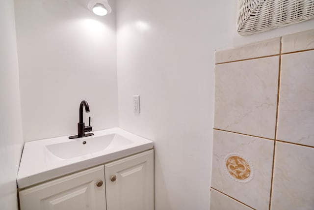 bathroom featuring visible vents and vanity