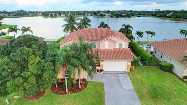 birds eye view of property featuring a water view