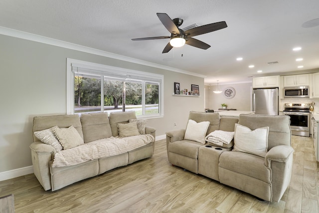 living room featuring crown molding, light hardwood / wood-style flooring, and ceiling fan