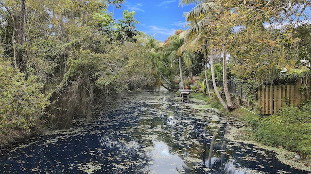 view of landscape with a water view