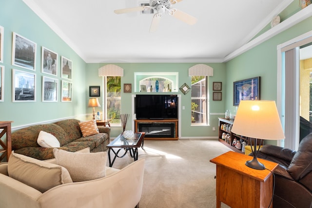 living room featuring crown molding, ceiling fan, lofted ceiling, and light carpet