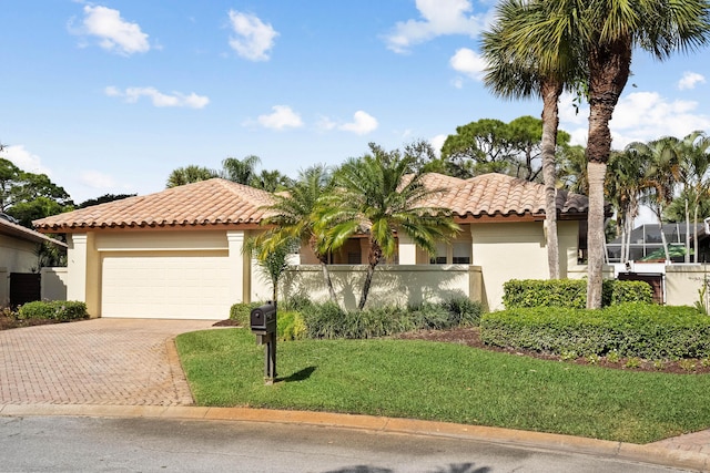 mediterranean / spanish-style house featuring a garage, a front lawn, and a lanai