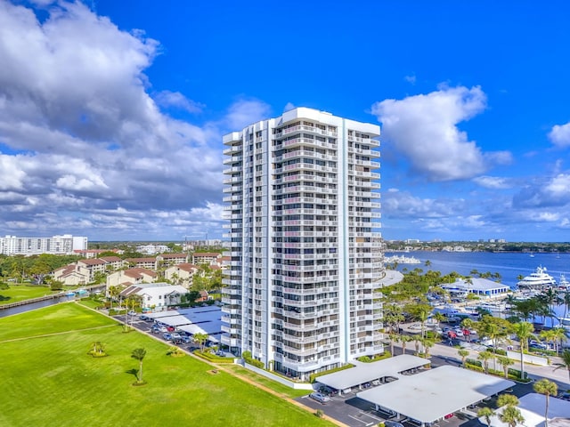 view of property featuring a view of city and a water view