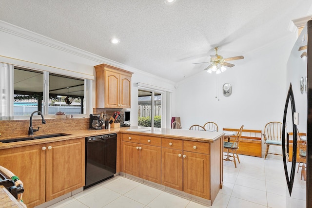 kitchen featuring sink, vaulted ceiling, ornamental molding, kitchen peninsula, and black appliances