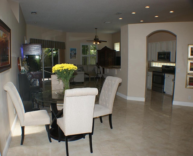 dining area featuring ceiling fan