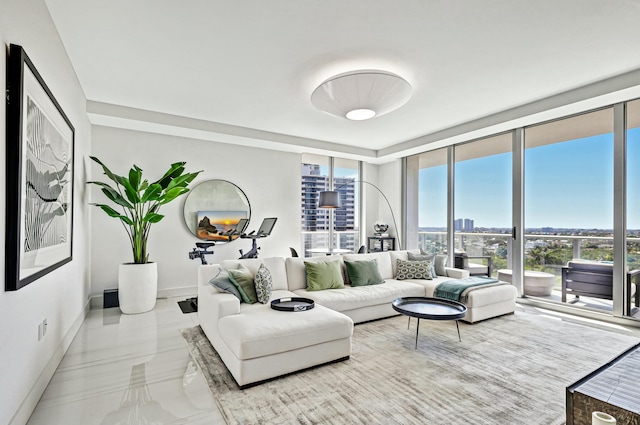 living room with floor to ceiling windows