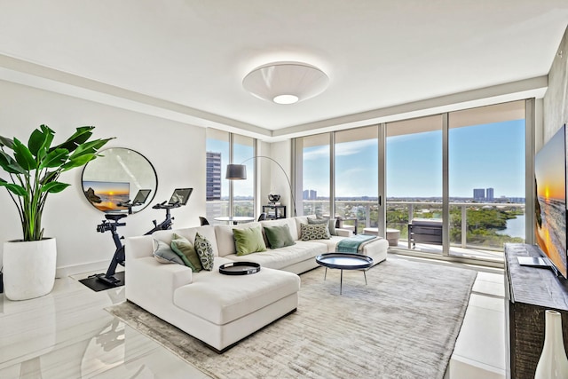 living room featuring floor to ceiling windows