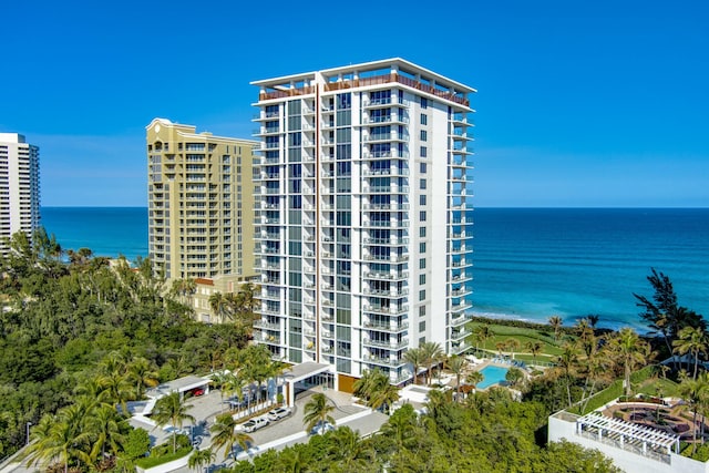 view of property with a water view