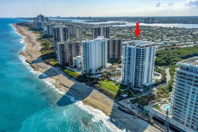 aerial view featuring a water view and a view of the beach