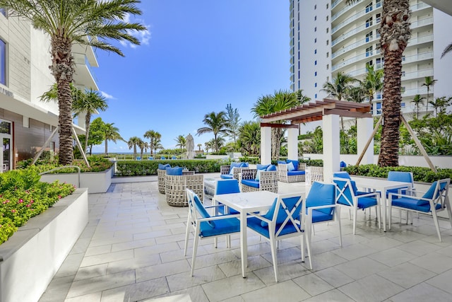 view of patio with a pergola and outdoor lounge area