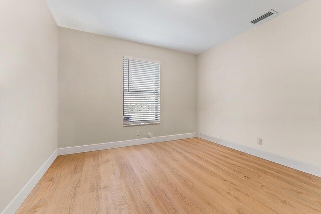 carpeted bedroom featuring multiple windows, access to exterior, ceiling fan, and french doors