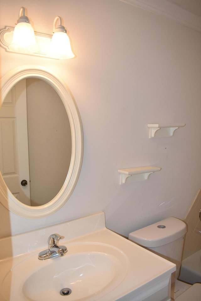 bathroom with toilet and sink