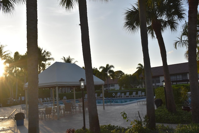 view of pool with a gazebo and a patio