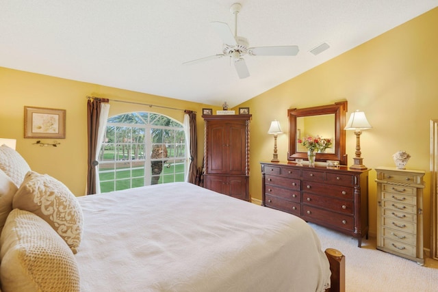 carpeted bedroom featuring vaulted ceiling and ceiling fan