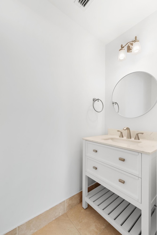 bathroom with vanity and tile patterned floors