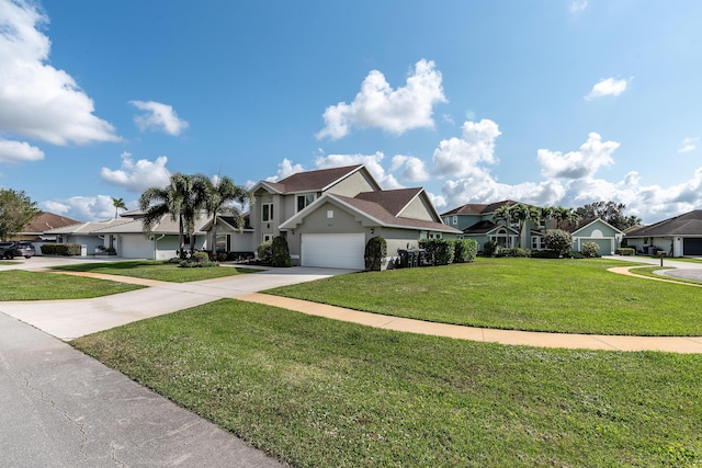 view of front facade featuring a garage and a front yard