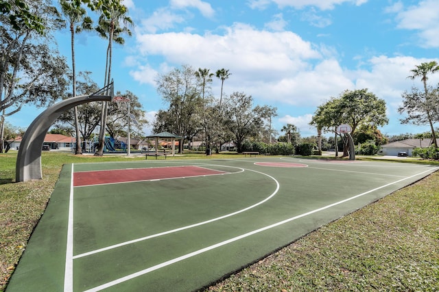 view of sport court featuring a gazebo and a playground