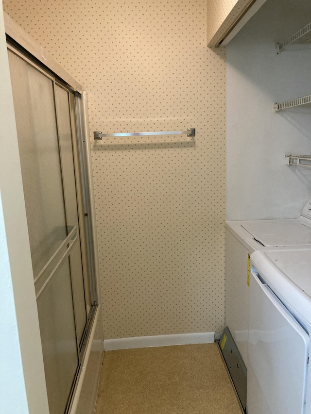 laundry room featuring separate washer and dryer