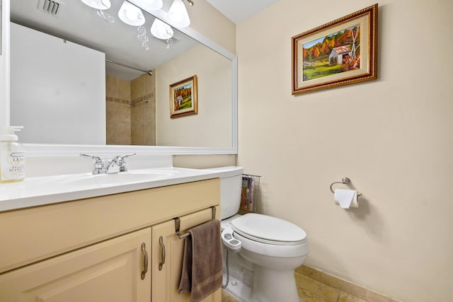 full bath featuring a shower, visible vents, toilet, vanity, and tile patterned flooring