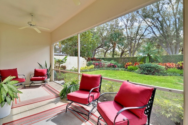 sunroom / solarium with ceiling fan