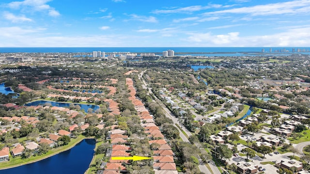 drone / aerial view with a water view