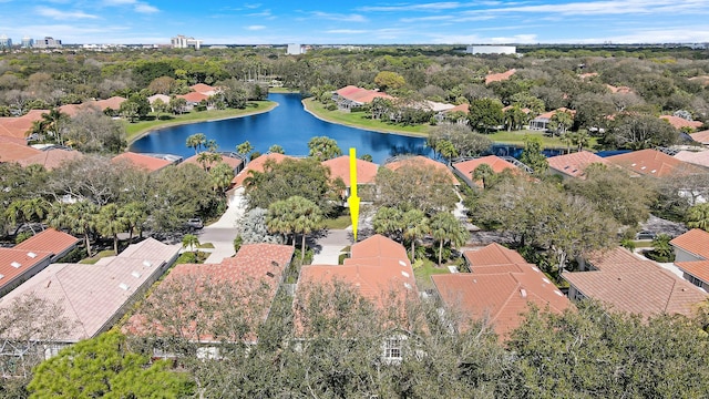 birds eye view of property featuring a water view