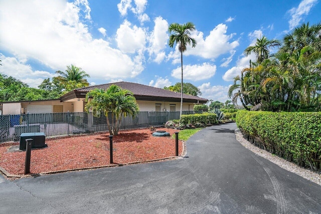 view of front of house with a garage